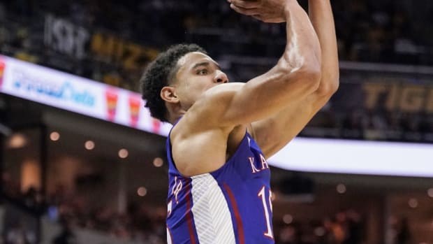 Dec 10, 2022; Columbia, Missouri, USA; Kansas Jayhawks guard Kevin McCullar Jr. (15) shoots against the Missouri Tigers during the second half at Mizzou Arena. Mandatory Credit: Denny Medley-USA TODAY Sports